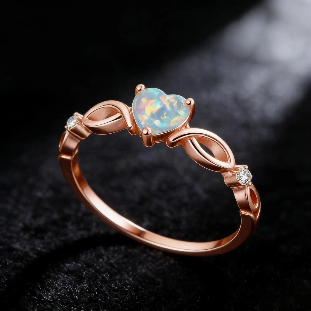 A heart-shaped opal silver ring with elegant and dynamic style, exquisite infinite symbol design