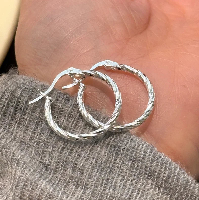 Hypoallergenic Silver Stud Earrings for Women - Lightweight Twisted Circle Design