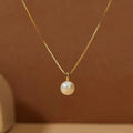 Elegant imitation pearl pendant necklace