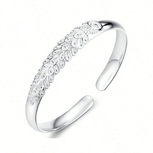 1 Peacock Spread Bracelet - Luxurious Designer Women's Open Bracelet, Original Jewelry Gift for Parties. Each 'feather petal' is finely polished and shiny. The bracelet fits the wrist curve snugly, comfortable to wear and doe