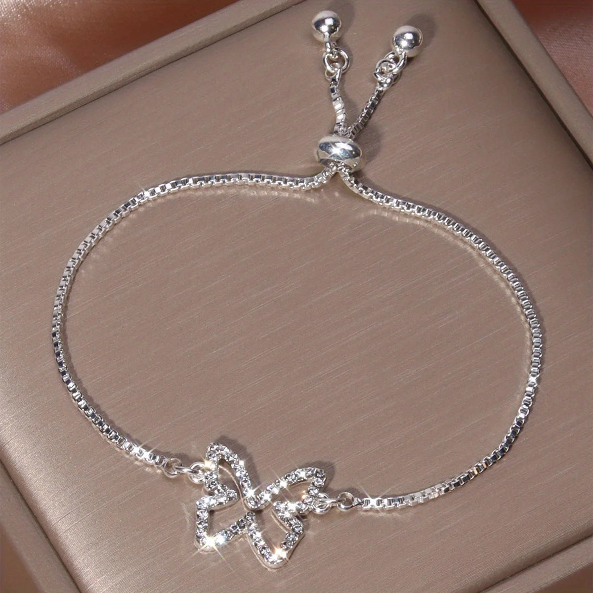 Silver rhinestone hollowed butterfly pull-out bracelet