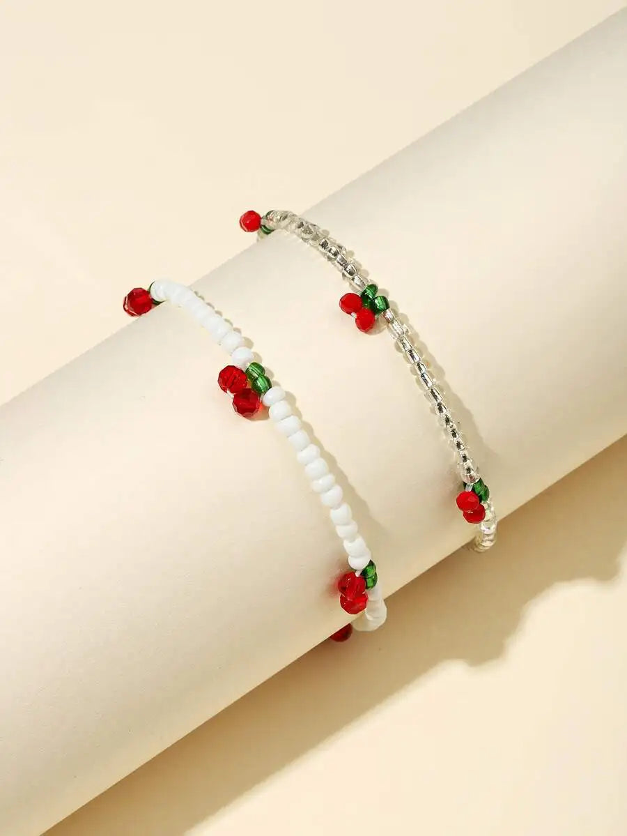 2pcs cherry-themed beaded bracelet with decorative charm