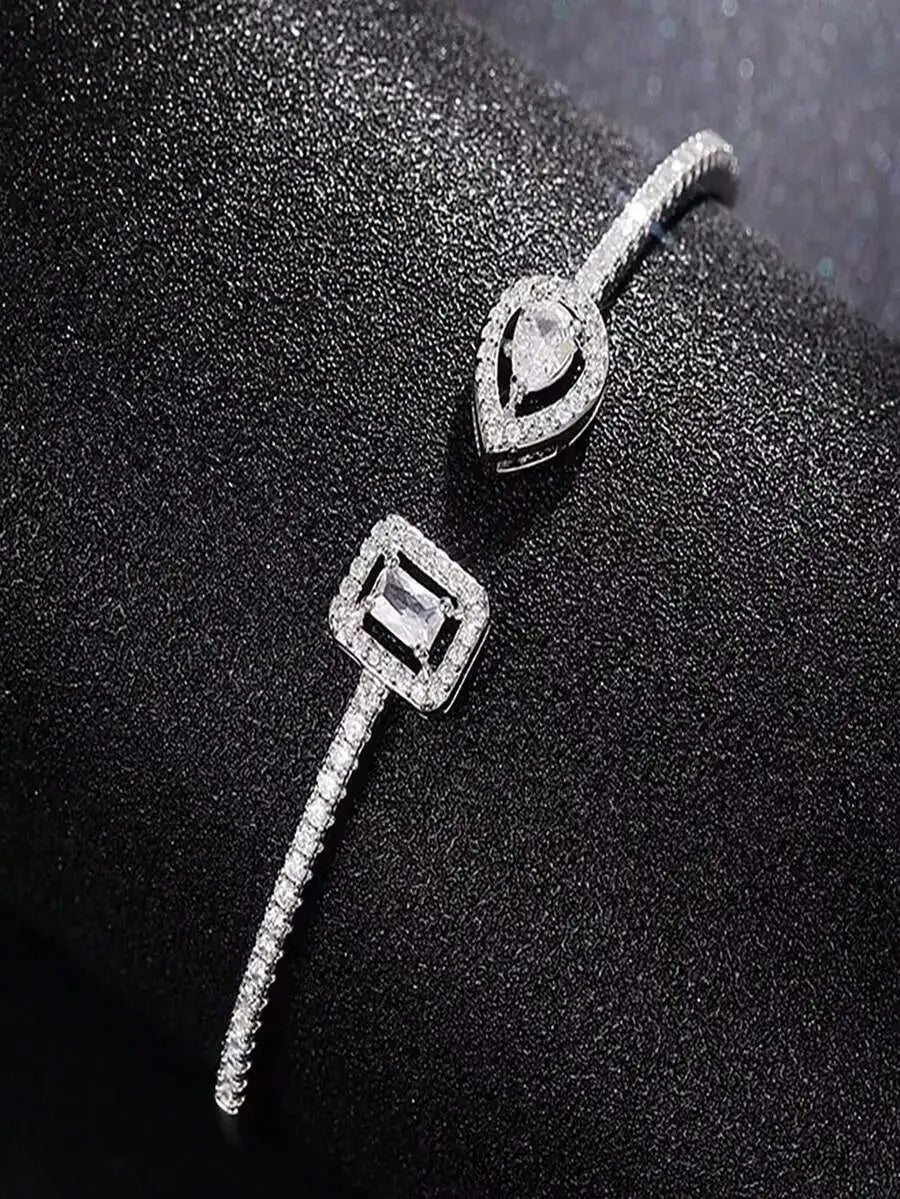 Cuff Bangle Bracelet With Rectangular And Teardrop Cubic Zirconia Accents, Silver-Tone