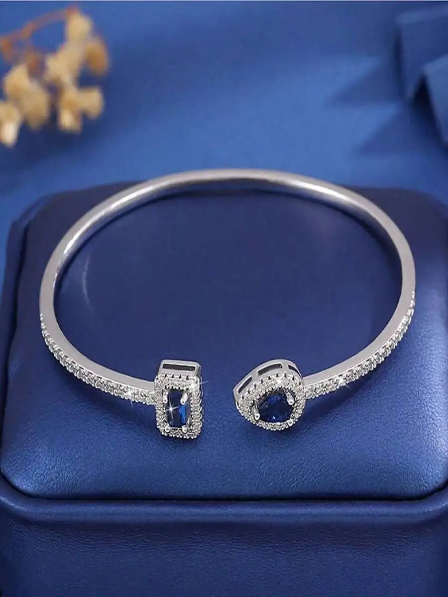 Cuff Bangle Bracelet With Rectangular And Teardrop Cubic Zirconia Accents, Silver-Tone