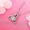 A Celtic knot triangle necklace - interwoven knot design, set with white synthetic zircon