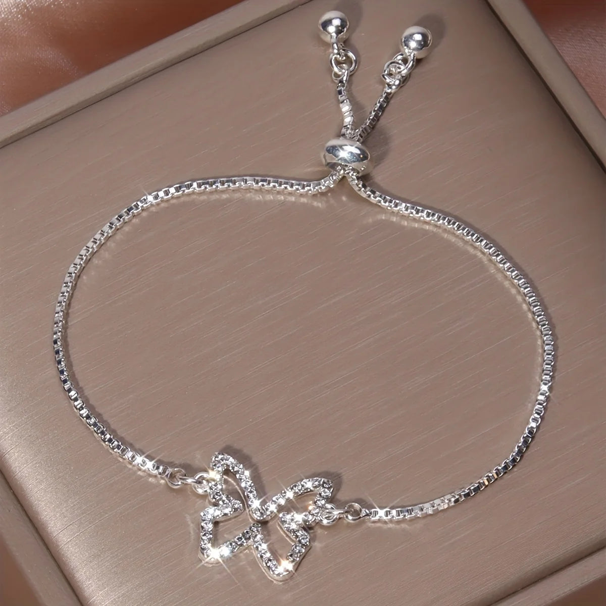 Silver rhinestone hollowed butterfly pull-out bracelet