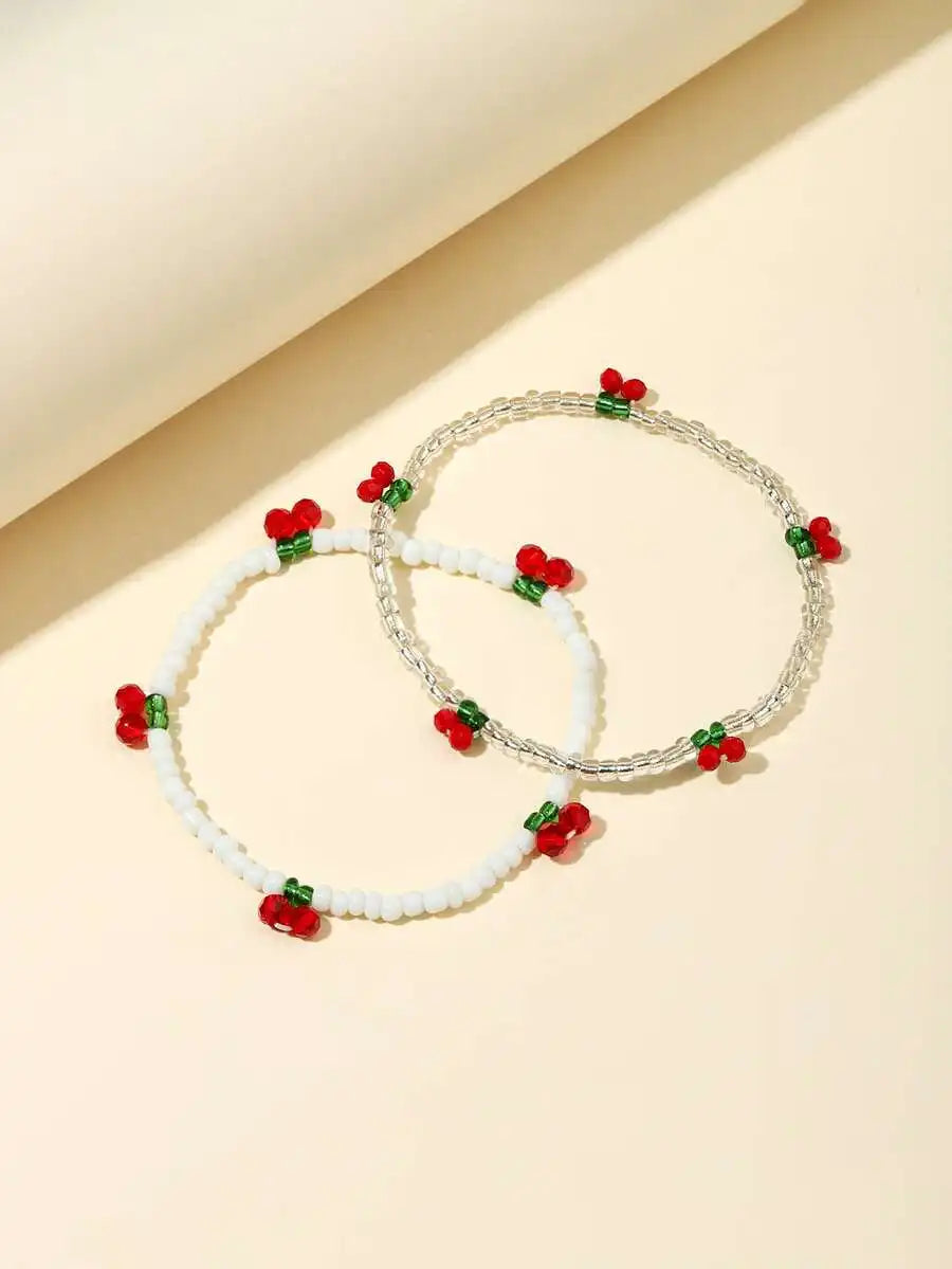 2pcs cherry-themed beaded bracelet with decorative charm