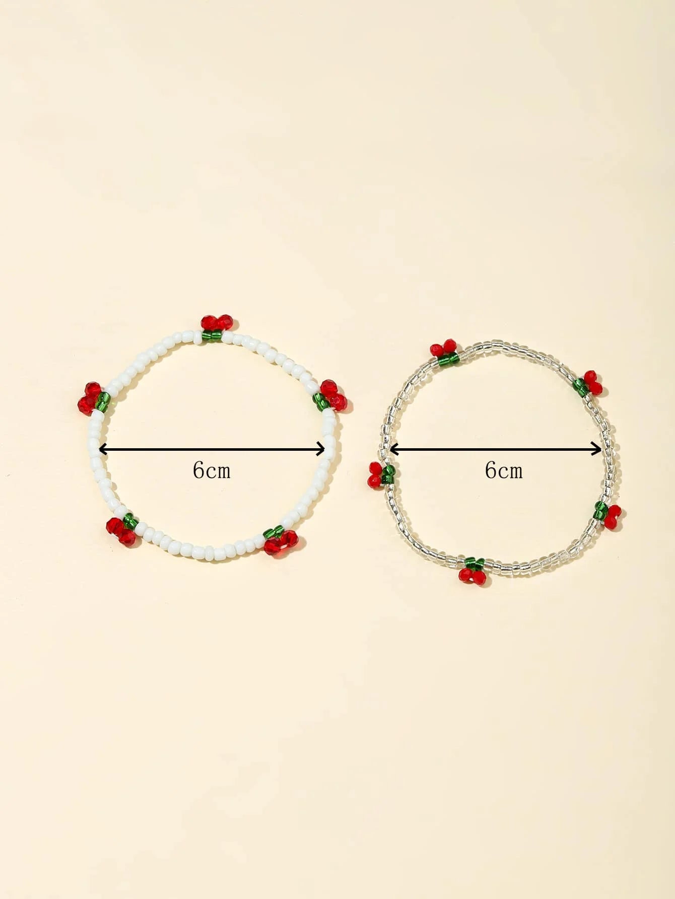 2pcs cherry-themed beaded bracelet with decorative charm