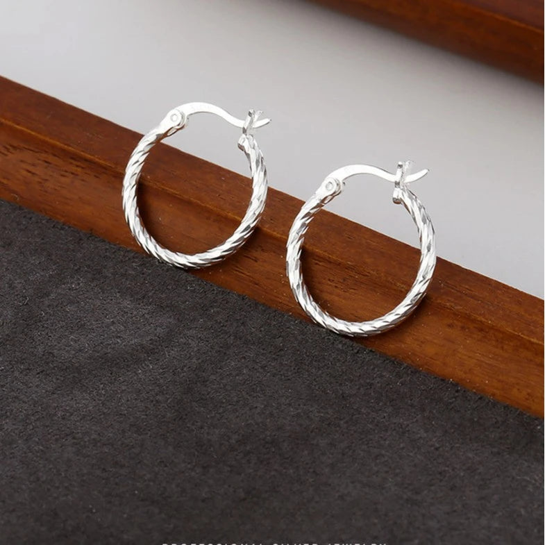 Hypoallergenic Silver Stud Earrings for Women - Lightweight Twisted Circle Design