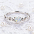 A heart-shaped opal silver ring with elegant and dynamic style, exquisite infinite symbol design